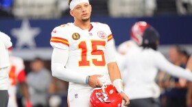 Kansas City Chiefs quarterback Patrick Mahomes warms up before an NFL football game against the Dallas Cowboys Thursday, Nov. 27, 2025, in Arlington, Texas. (AP Photo/LM Otero)