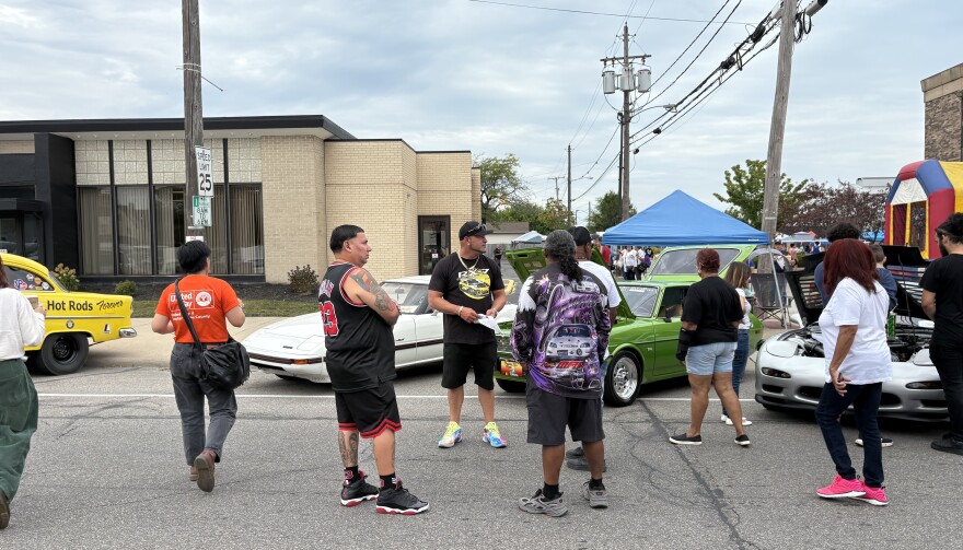 People gather at a car show during El Centro's community block party.