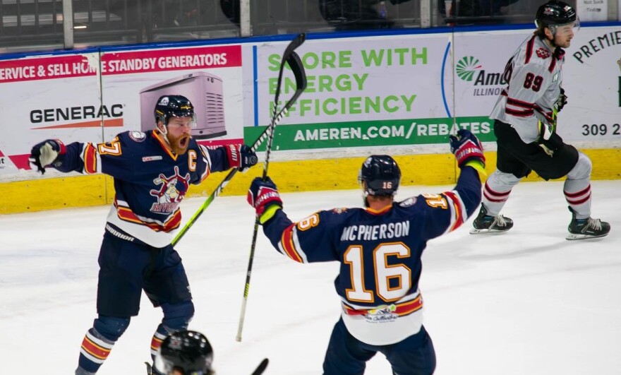 Peoria Rivermen captain Alec Hagaman, left, celebrates with teammate Mitchell McPherson during the team's 6-4 win over Huntsville in Game 2 of the SPHL President's Cup Final on Saturday at Carver Arena. Hagaman scored three goals in Game 2 and two more in a 5-1 win in Game 3 as the Rivermen earned their second title in three years.