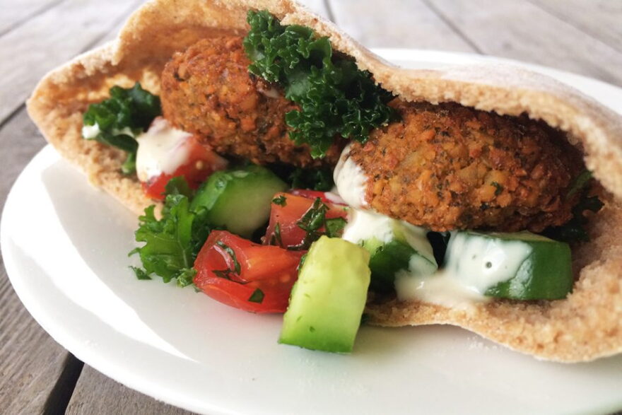 Top your falafel with tahini sauce, fresh greens, tomato/cucumber salad, or whatever you wish