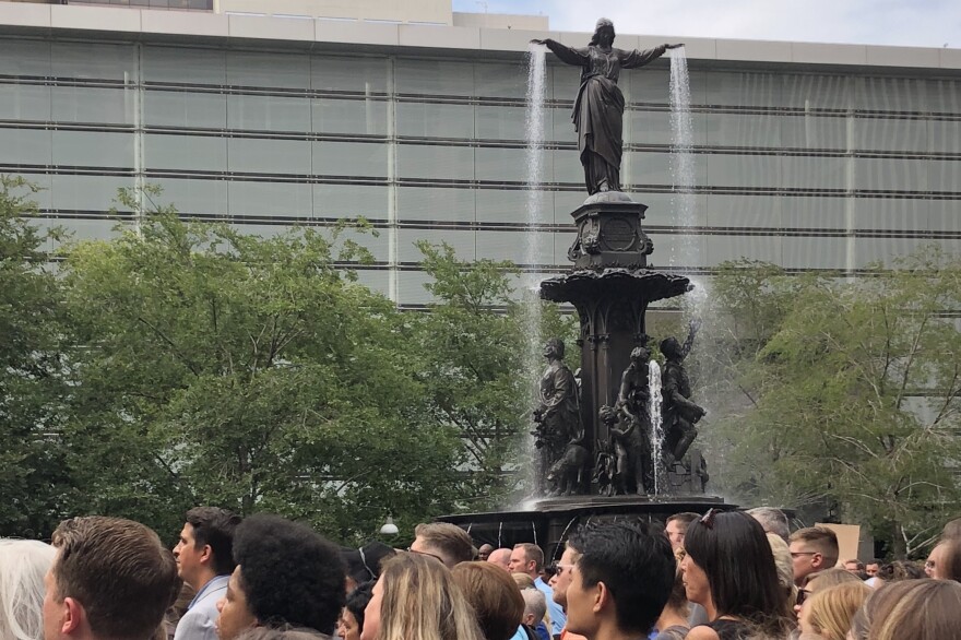 Hundreds gathered Friday afternoon at Fountain Square for a moment of silence for the victims of Thursday's deadly shooting at Fifth Third Center.