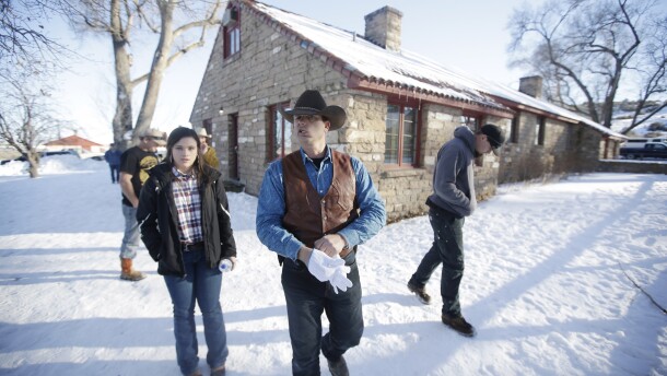 FILE - In this Jan. 8, 2016, file photo, Ryan Bundy walks through the Malheur National Wildlife Refuge near Burns, Ore. The armed takeover of Malheur National Wildlife Refuge and its aftermath was overwhelmingly selected Oregon's story of the year for 2016.