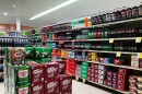 The pop/soda aisle of a grocery store.
