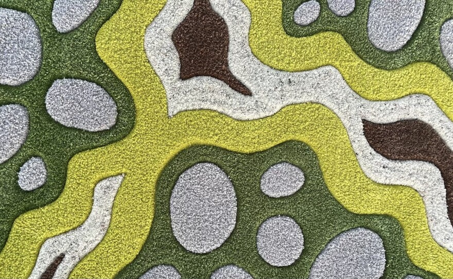 Some of Julia Andreas' tufted rugs