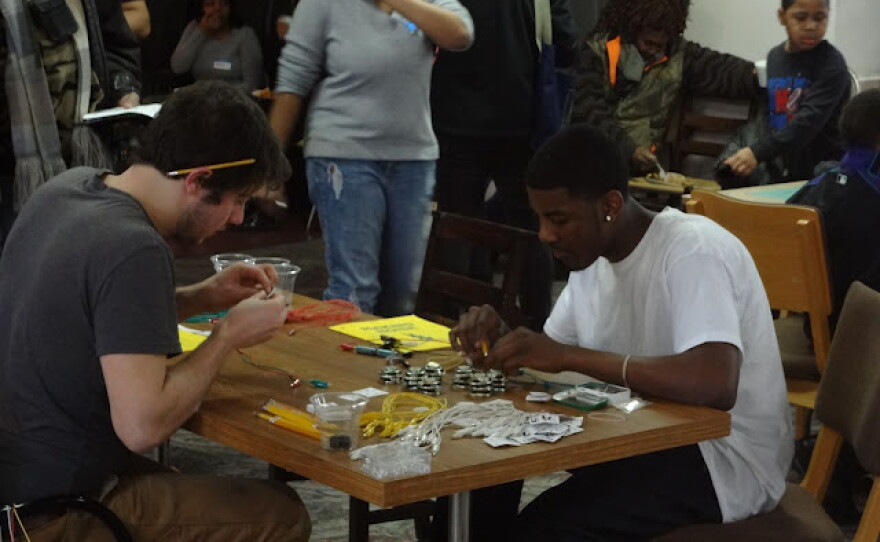 The "mini synthesizer" station at the discotech teaches people about basic electronics