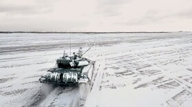 On Wednesday, Feb. 2, 2022, a tank drives during a Russian and Belarusian joint military drills at Brestsky firing range, Belarus. Russian and Belarus troops held joint combat training at firing ranges in Belarus on Wednesday as tensions remain high under the looming threat of war with Ukraine. The drills involved motorized rifle, artillery and anti-tank missile units, as well tanks' and armored personnel carriers' crews.