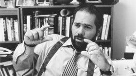 Ray Suarez at his desk