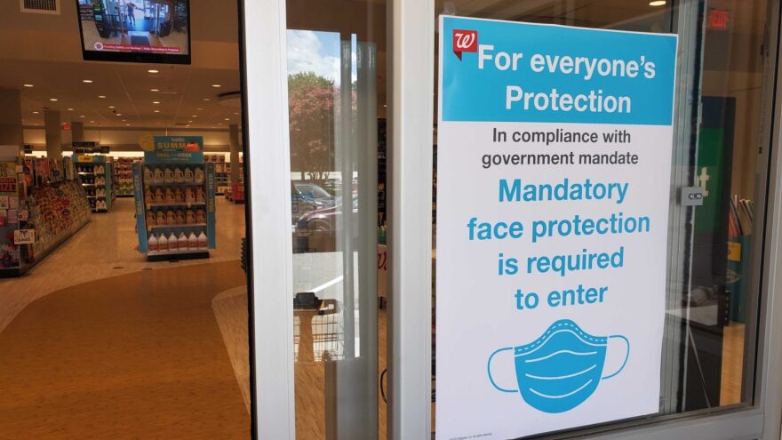 A sign on the door at a Walgreens in Raleigh, North Carolina. 
