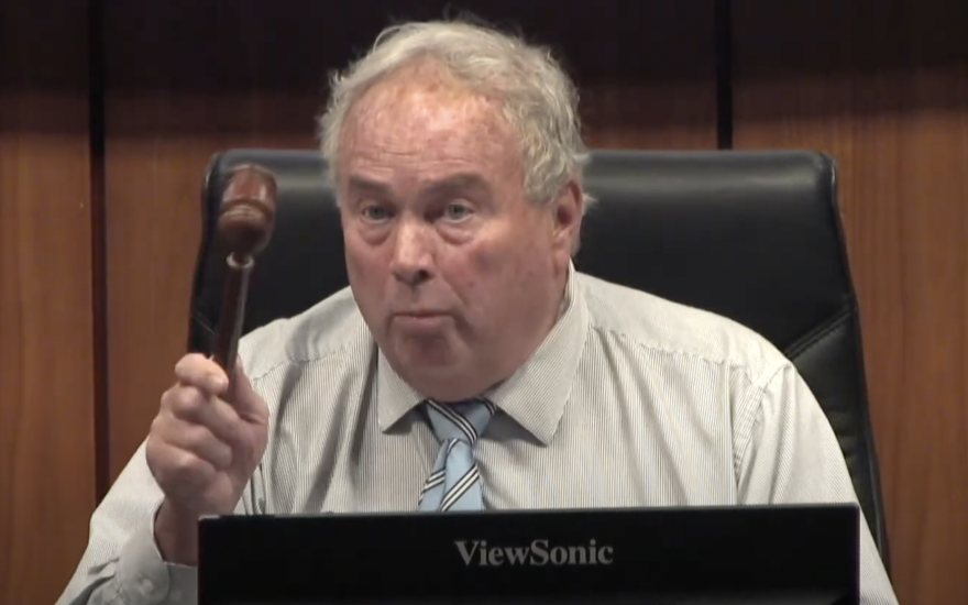 Union County Commissioners Chair Dennis Rape threatens to have school board member Gary Sides removed from the meeting during the June 13 budget vote.