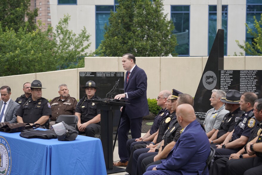 Attorney General Russell Coleman speaks at the Northern Kentucky Law Enforcement Memorial in Covington.
