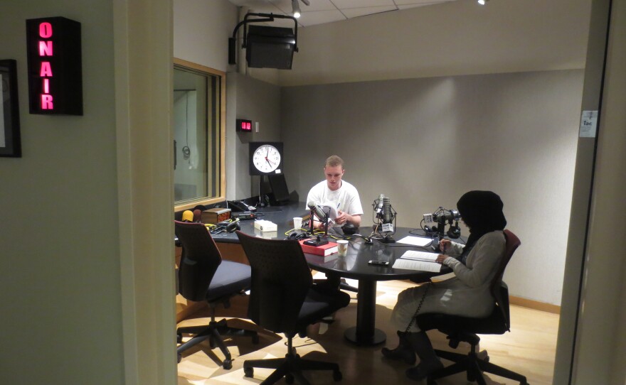 Recording in the KUOW studio on University Way in Seattle.