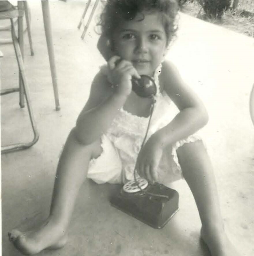 marie_manilla_on_phone.jpg