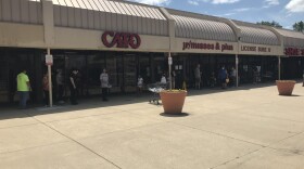 About 50 people stood in line at the BMV at Dayton's Pinewood Plaza at 12pm on Tuesday.