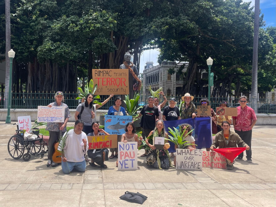 Protestors oppose RIMPAC at the State Capitol on Aug. 4, 2026.