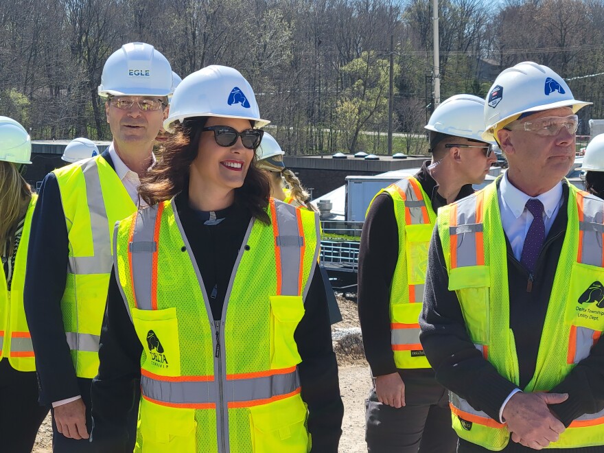 Governor Gretchen Whitmer tours a Delta Township Water Resource Recovery Facility project alongside state officials.