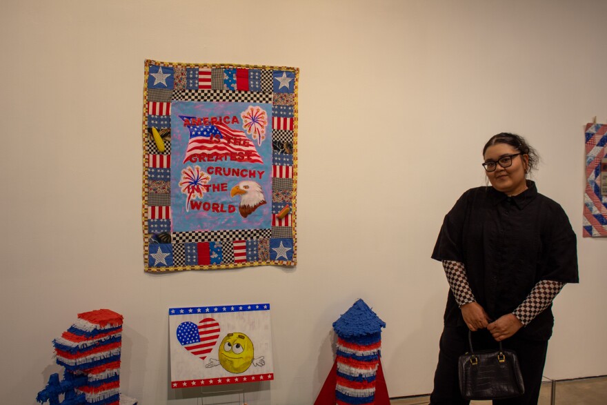 Ursula Zavala next to her installation at the Centro de Artes Gallery.