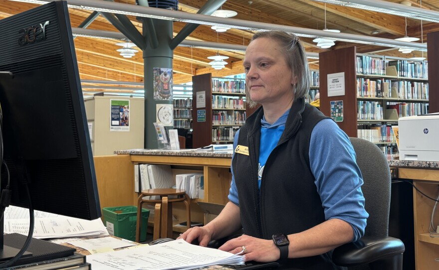 Grand Rapids Director of Library Services Amy Dettmer works Nov. 21, 2025, at the Grand Rapids Area Library.