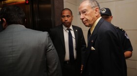 Senate Judiciary Committee Chairman Charles Grassley (R-IA) is surrounded by staff and security as he heads for a secure meeting space inside the U.S. Capitol Visitors Center to review the FBI report about alleged sexual misconduct by Supreme Court nominee Judge Brett Kavanaugh on Thursday in Washington, D.C. (Photo by Chip Somodevilla/Getty Images)