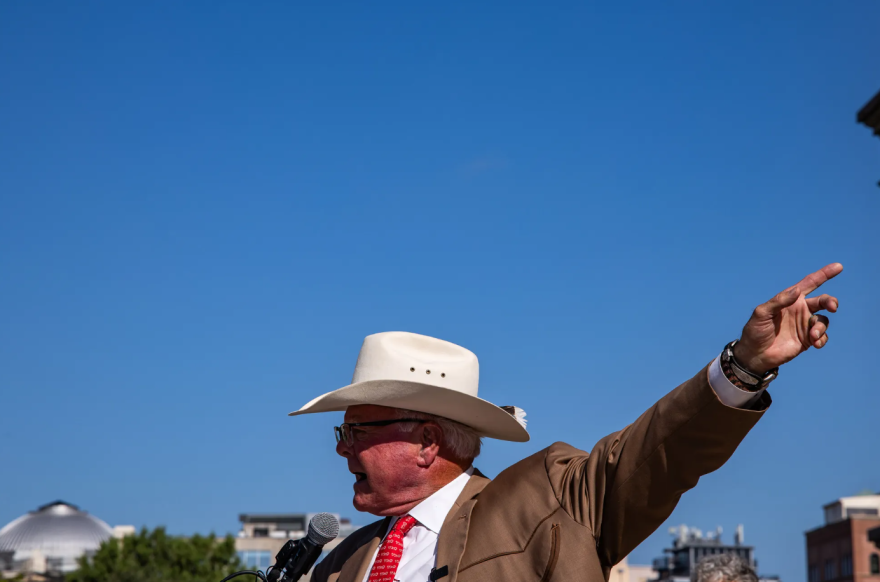 Texas Agriculture Commissioner Sid Miller speaks at a rally against data center development on the Capitol grounds in Austin on July 27, 2026.
