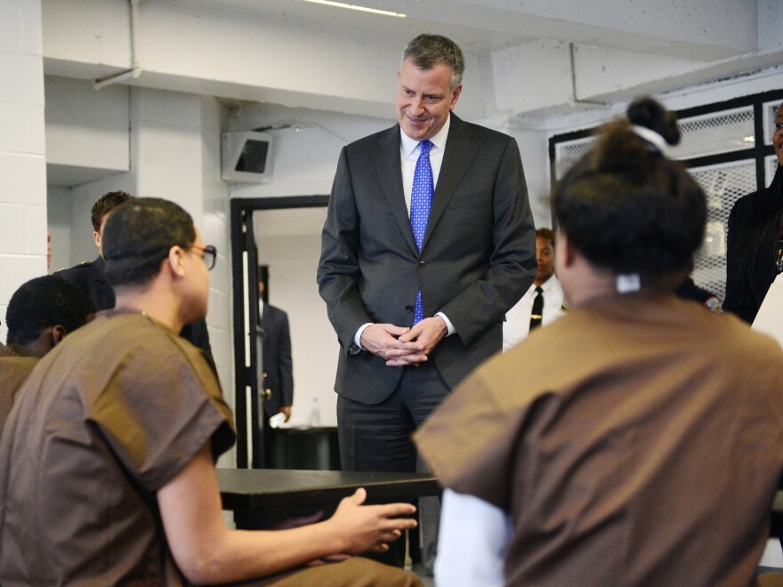 In December, New York Mayor Bill de Blasio met with youth offenders at alternative housing on Rikers Island. A new state proposal would spare teens younger than 18 from serving time in adult prisons.