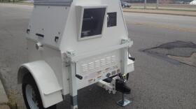 Akron already uses unmanned traffic cameras, like the one pictured, in school zones. The police department is requesting $18,000 for speed radar guns that would be operated by police officers.