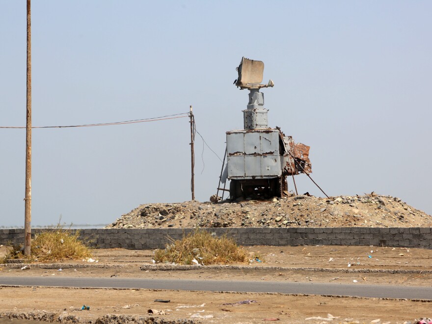 A destroyed vehicle bearing a radar antenna is pictured in the Yemeni port city of Hodeidah on Oct. 13. The U.S. military directly targeted Yemen's Houthi rebels for the first time, hitting radar sites controlled by the insurgents after U.S. warships came under missile attacks twice in four days.