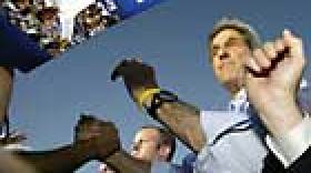 Democratic presidential nominee Sen. John Kerry shakes hands with supporters after a rally in Albuquerque, N.M., Sept. 16, 2004.