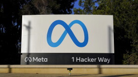 FILE - Meta's logo is seen on a sign at the company's headquarters, Nov. 9, 2022, in Menlo Park, Calif. Newly unredacted documents from New Mexico’s lawsuit against Meta released Wednesday, Jan. 17, 2024, underscore the Facebook and Instagram parent’s “historical reluctance” to keep children safe on its platforms, according to the complaint. (AP Photo/Godofredo A. Vásquez, File)