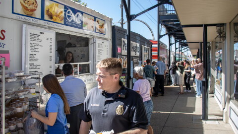 Fall Festival attendees order food from booths on Tuesday of the festival. Non-profits earn money form their booths, and the Nut Club fundraises significantly from the half-pot raffle.