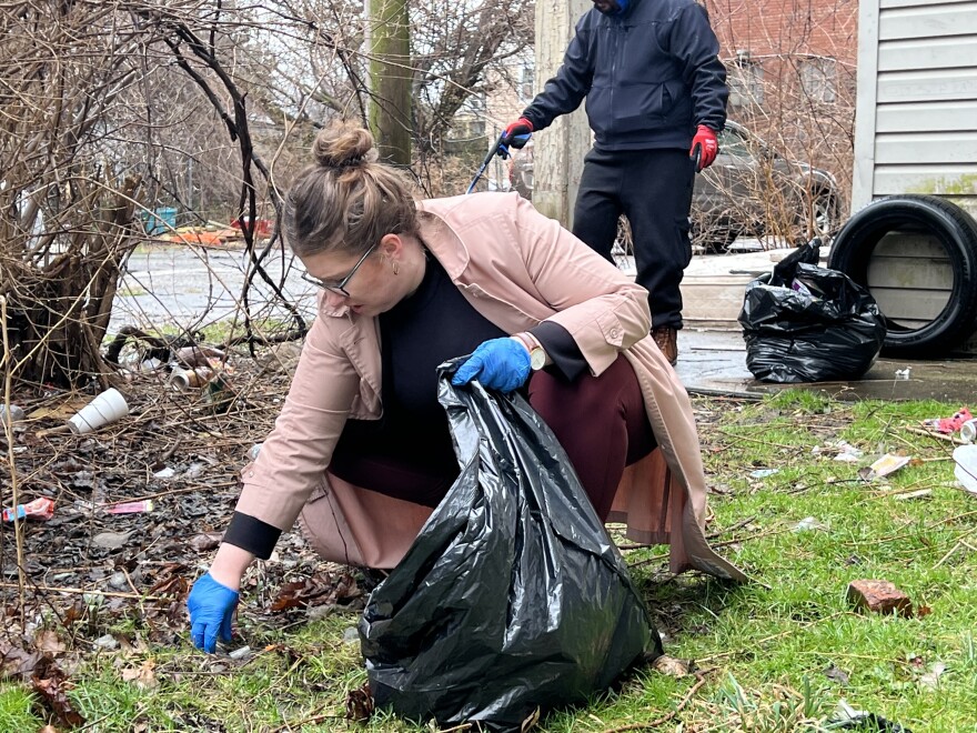 Ward 12 Councilmember Rebecca Maurer cleans up a problem property in Slavic Village.