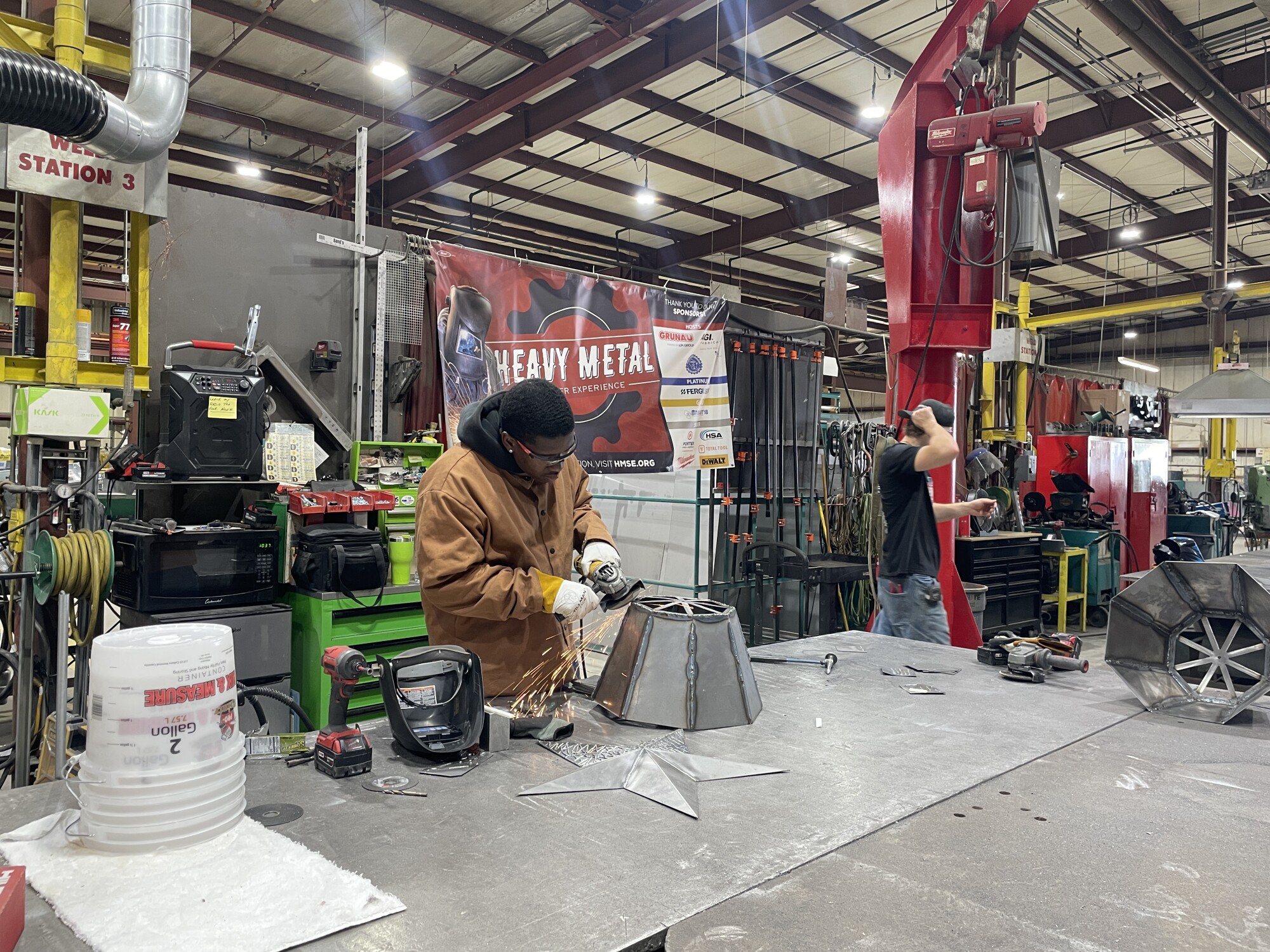 Move over, campfire songs! This Milwaukee area summer camp features welding, soldering episode artwork