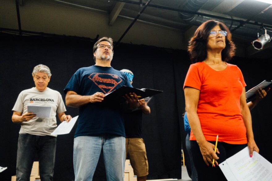 Cast members rehearse a scene from "Ring of Red: A Barrio Story," which brings to the state oral histories from Mexican-American veterans of the Vietnam War.