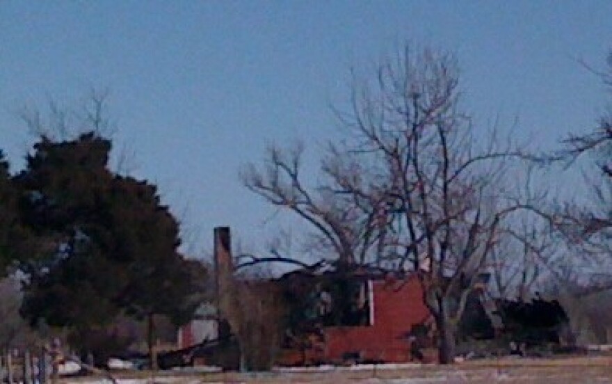 The burned-out shell of a vacant home on North Memorial, west of Owasso.