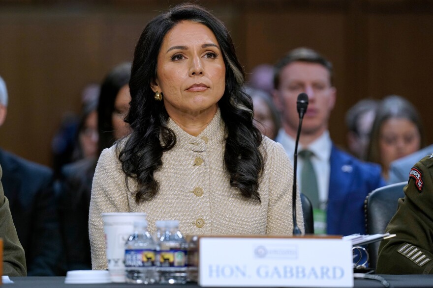 FILE - Director of National Intelligence Tulsi Gabbard listens during the Senate Committee on Intelligence hearings on Capitol Hill, March 18, 2026, in Washington.