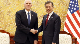Vice President Mike Pence, left, shakes hands with South Korean President Moon Jae-in prior to their meeting at the presidential office Blue House in Seoul Thursday, Feb. 8, 2018. (Kim Hee-chul/Pool Photo via AP)