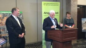 Mayor Greg Ballard, left, and Gov. Mike Pence announced the Angie's List expansion. Owner Angie Hicks is at right.