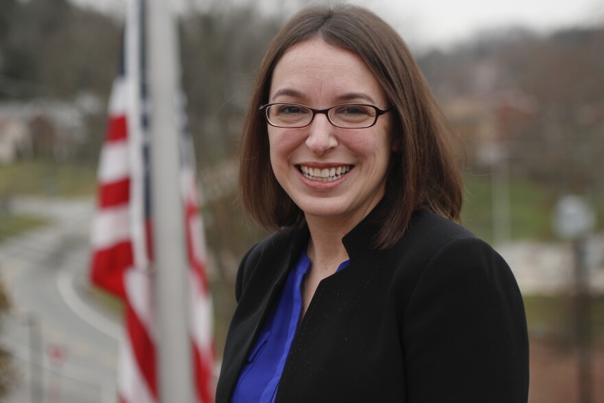 Democrat Pennsylvania state senator Lindsey Williams stands near the flag at the Shaler Municipal buiding where her office is on Wednesday, Dec. 12, 2018, in Glenshaw, Pa.