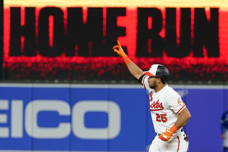 Baltimore Orioles' Anthony Santander runs the bases after hitting a solo home run off Toronto Blue Jays relief pitcher Trevor Richards during the eighth inning of a baseball game, Wednesday, Aug. 23, 2023, in Baltimore. Santander hit two home runs and the Orioles won 7-0. (AP Photo/Julio Cortez)