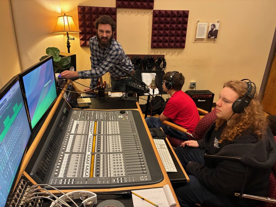 Music Lab assistant Luke Haefner helps out during a production workshop at the Jefferson Center Music Lab