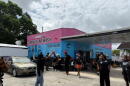 Members of The Black Collective organization gather outside Famous Car Wash to support calls for accountability over a construction project. They are planning a rally and demonstration on Thursday, Oct. 22, 2026, to call attention to the heavy financial strain on local business caused by prolonged roadwork along Northwest 22nd Avenue in Miami.