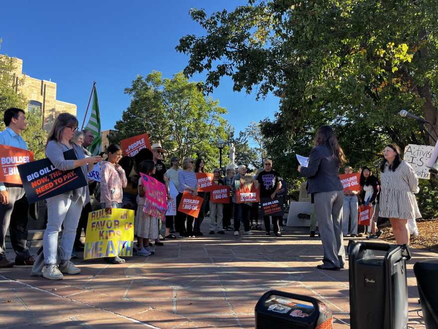 Mica Parkin of 350 Colorado addresses supporters at the Boulder County Courthouse on Monday October 5, 2026,