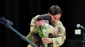 U.S. Air Force Staff Sgt. Erica Gildae hugs her daughter Riley Gildae at Riley’s promotion ceremony at Cranbury Elementary School in Norwalk Connecticut on 6/23/26.