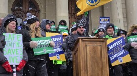 Kevin Moore, president of Teamsters Michigan, speaks on the steps of the Michigan Capitol on Tuesday, March 17, 2026.