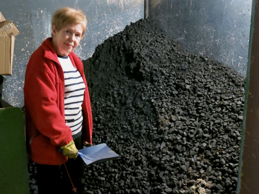 Arleta Wolek, a 73-year-old retired production line worker in Krakow, keeps her coal-burning stove in her basement. She feeds the 4-year-old stove from a nearby pile of coal that's almost as tall as she is.