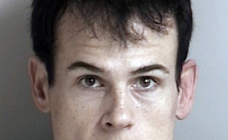 Matthew Muller after he was arrested on robbery and assault charges.