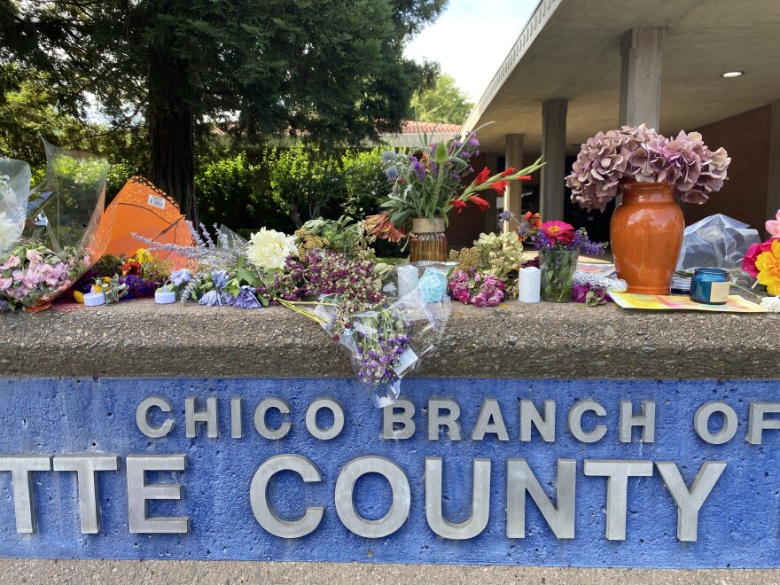 Flowers are left outside the Butte County Library in Chico, Calif. on June 25, 2026.