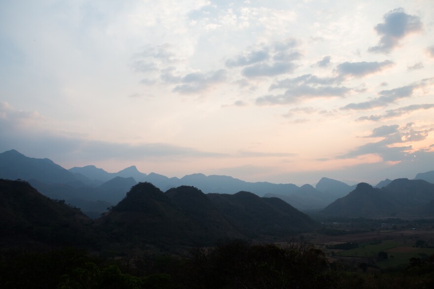 Dusk settles on the border between Guatemala and Chiapas, Mexico. U.S. officials estimate they apprehended more than 100,000 people crossing the U.S. Southern border last month — the most in more than a decade.