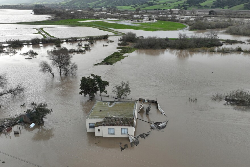 A home submerged in floodwater as the Salinas River overflowed its banks on Friday.