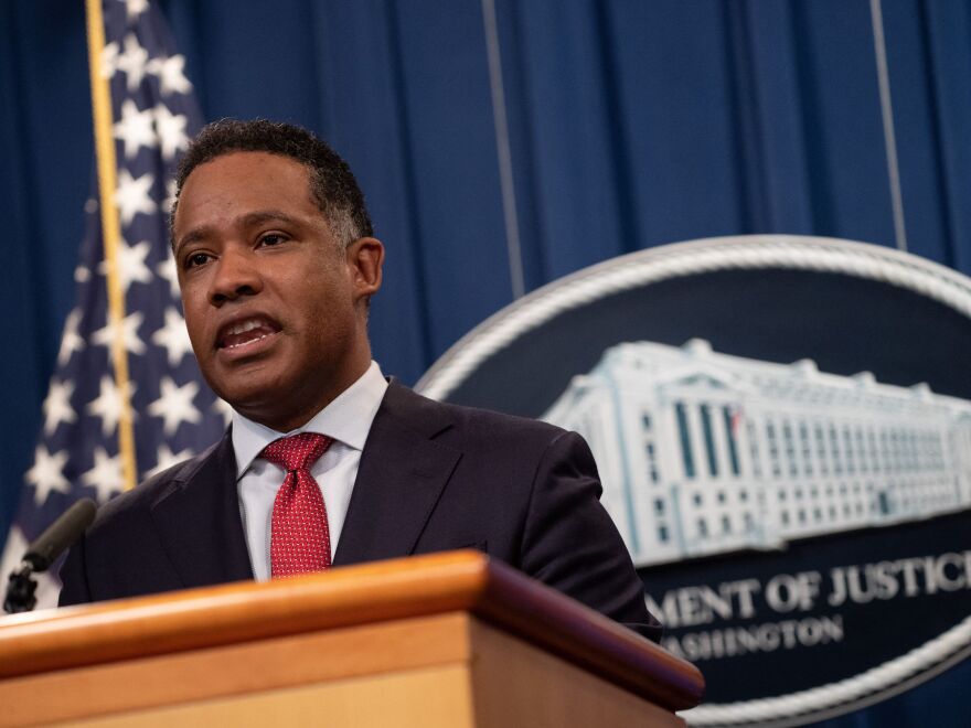 Kenneth Polite, the assistant attorney general of the Justice Department's Criminal Division, speaks during a news conference at the department in October.