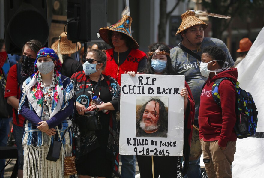 Indigenous activists express support for Black Lives Matter in the occupied protest zone on Sunday.